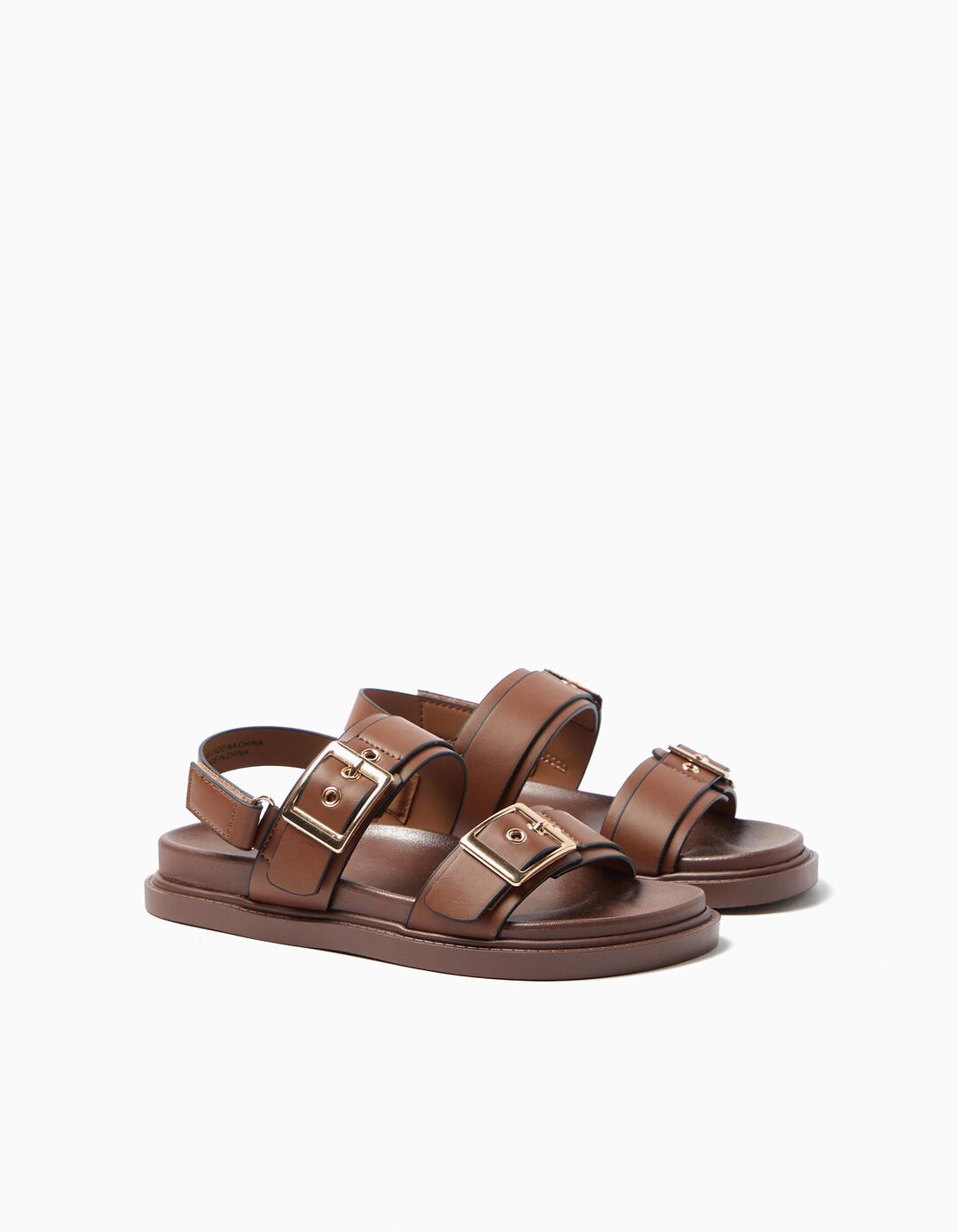 Sand&aacute;lias, Menina, Bege