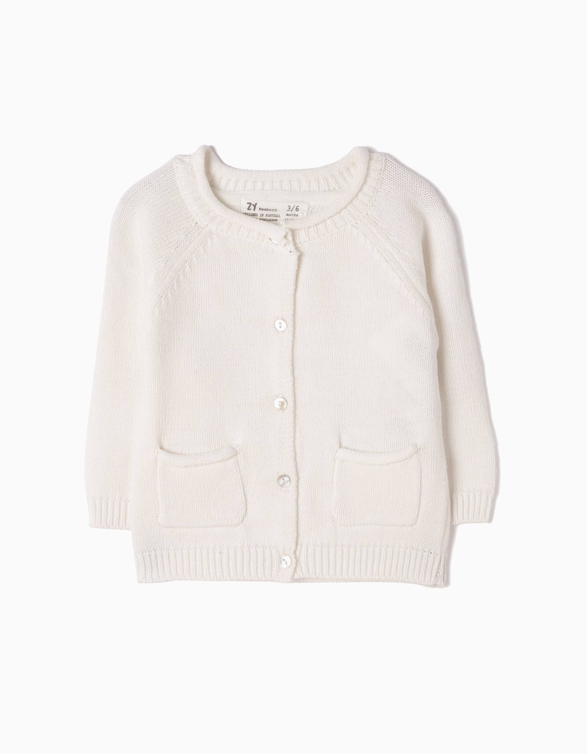 newborn white sweater