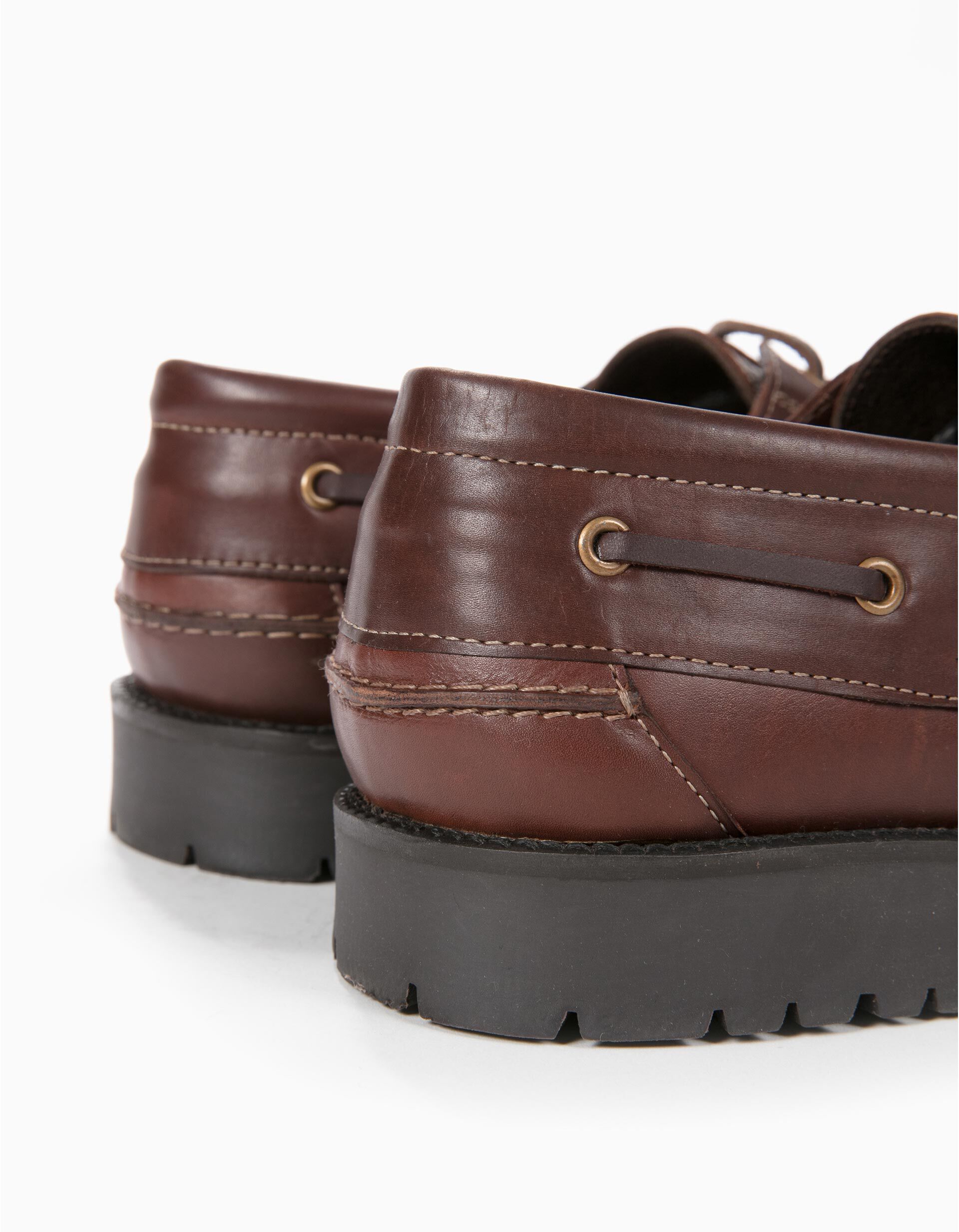 sapatos de vela